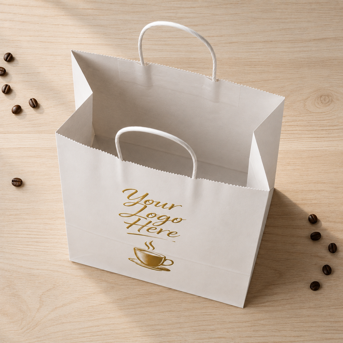 Top view open white paper coffee takeaway bags with custom gold foil logo, eco coffee shop bags for takeaway coffee packaging laid on wood table with scattered coffee beans