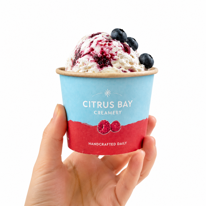 Hand holding custom printed 4oz compostable ice cream paper cup with logo, food grade leak resistant freezer safe disposable dessert cup for gelato yogurt takeaway café retail eco friendly dessert packaging wholesale bakery supply branded dessert containers