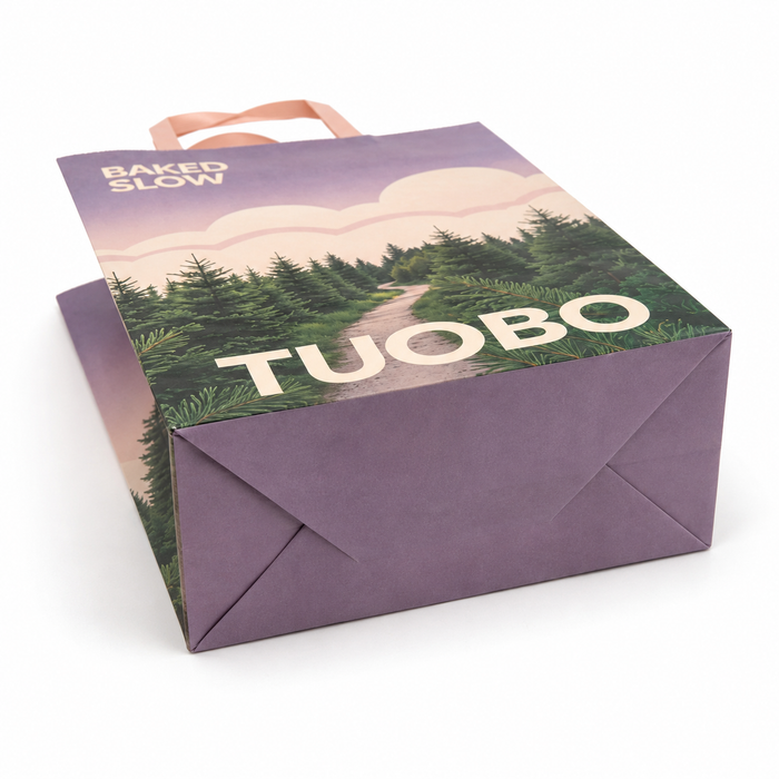 Custom printed paper bags with pink ribbon handles, branded TUOBO retail paper shopping bags, sustainable food packaging bakery paper bags wholesale