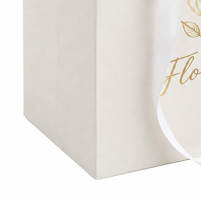 Detailed side view of an eco friendly paper gift bag with clean fold lines, highlighting the high-quality material used for wholesale flower bags and retail flower packaging solution designs.