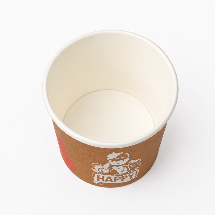 Top-down white background product shot of empty kraft custom branded small paper ice cream cup, cartoon happy character print disposable mini dessert tub for bulk wholesale ice cream shop supplies