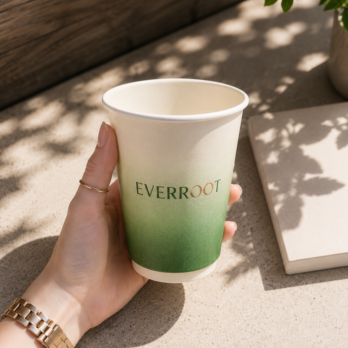 Green gradient custom printed eco paper coffee cup with EVERROOT branding, sustainable disposable hot drink cup for café takeaway service