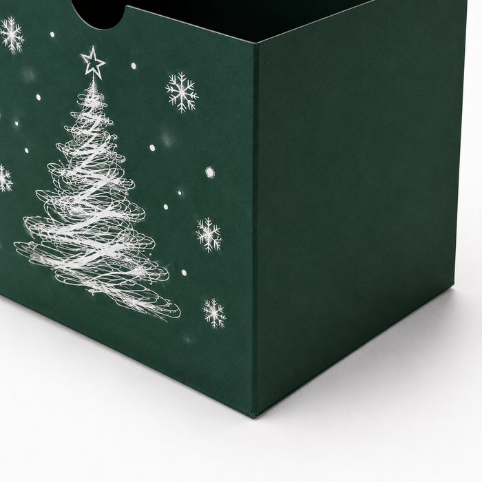 Close-up angle of dark green rigid Christmas gift box corner showing precise folding structure, matte finish, and white festive tree print, ideal for custom packaging, gift box manufacturing, and B2B wholesale supply.