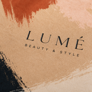Close-up detail of premium logo printing on an abstract brushstroke kraft paper shopping bag, showcasing sharp typography, textured surface, and high-quality luxury packaging finish.