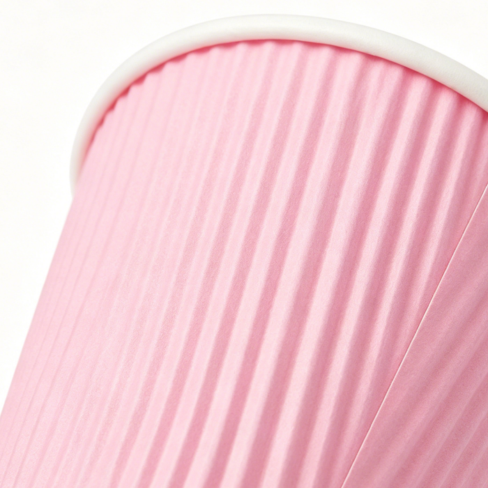 Macro close-up detail photo pink vertical ripple wall paper cup, highlight corrugated kraft paper insulation texture and cup rim craft, blank custom printable disposable coffee cup material display, 8K seamless white background