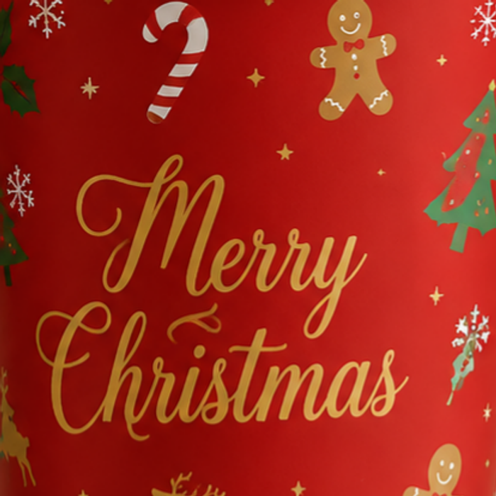 Close-up view of custom printed red Christmas disposable paper coffee cup with gold Merry Christmas foil print, gingerbread man candy cane pine tree seasonal pattern, recyclable single wall hot beverage paper cups bulk for cafe retail holiday service