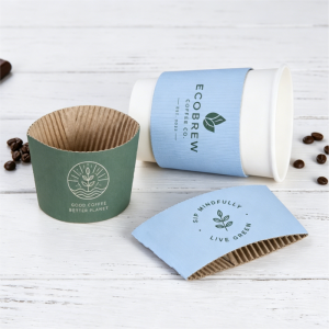 Custom printed eco-friendly corrugated coffee cup sleeves mockup, green and light blue branded paper cup wraps on a white wooden table, recyclable heat-resistant paper cup holders for takeaway coffee
