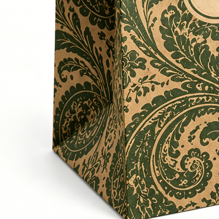 8K clear texture closeup of custom vintage dark green paisley printed kraft paper gift bag, wholesale eco friendly shopping tote bag detail shot, sharp antique floral pattern kraft packaging bag